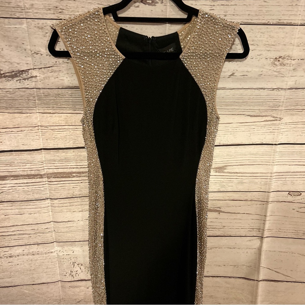 Xscape black dress with shear sides